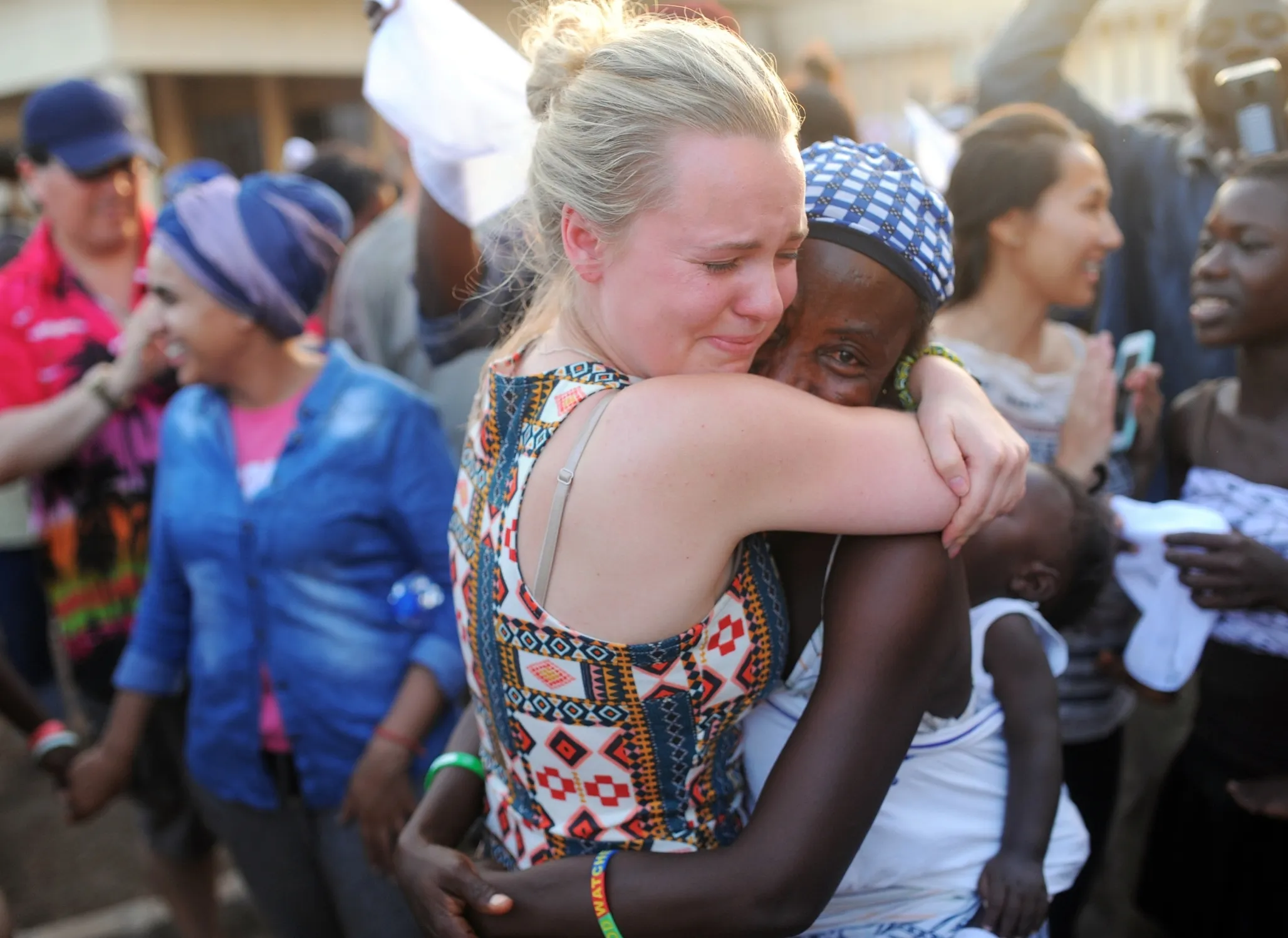 Hugs shared during a surgical program.