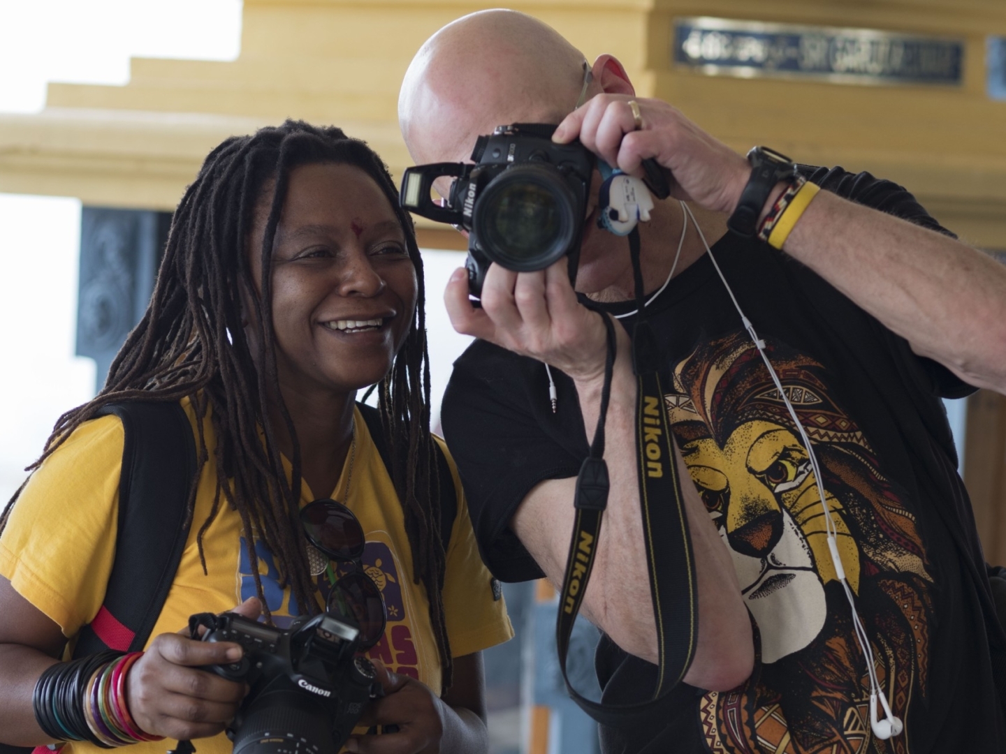 Photographers share a moment together during a surgical program.