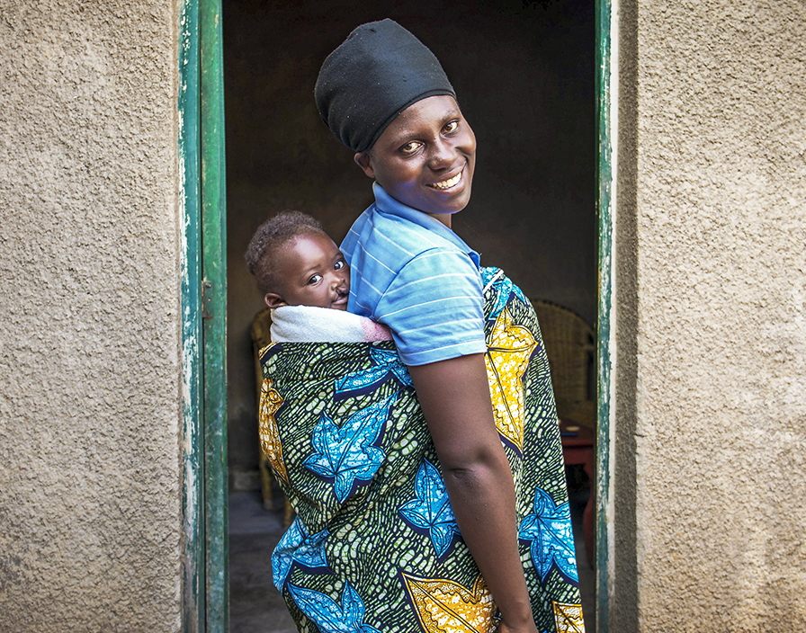 Adolphe and his mom smile for the camera.