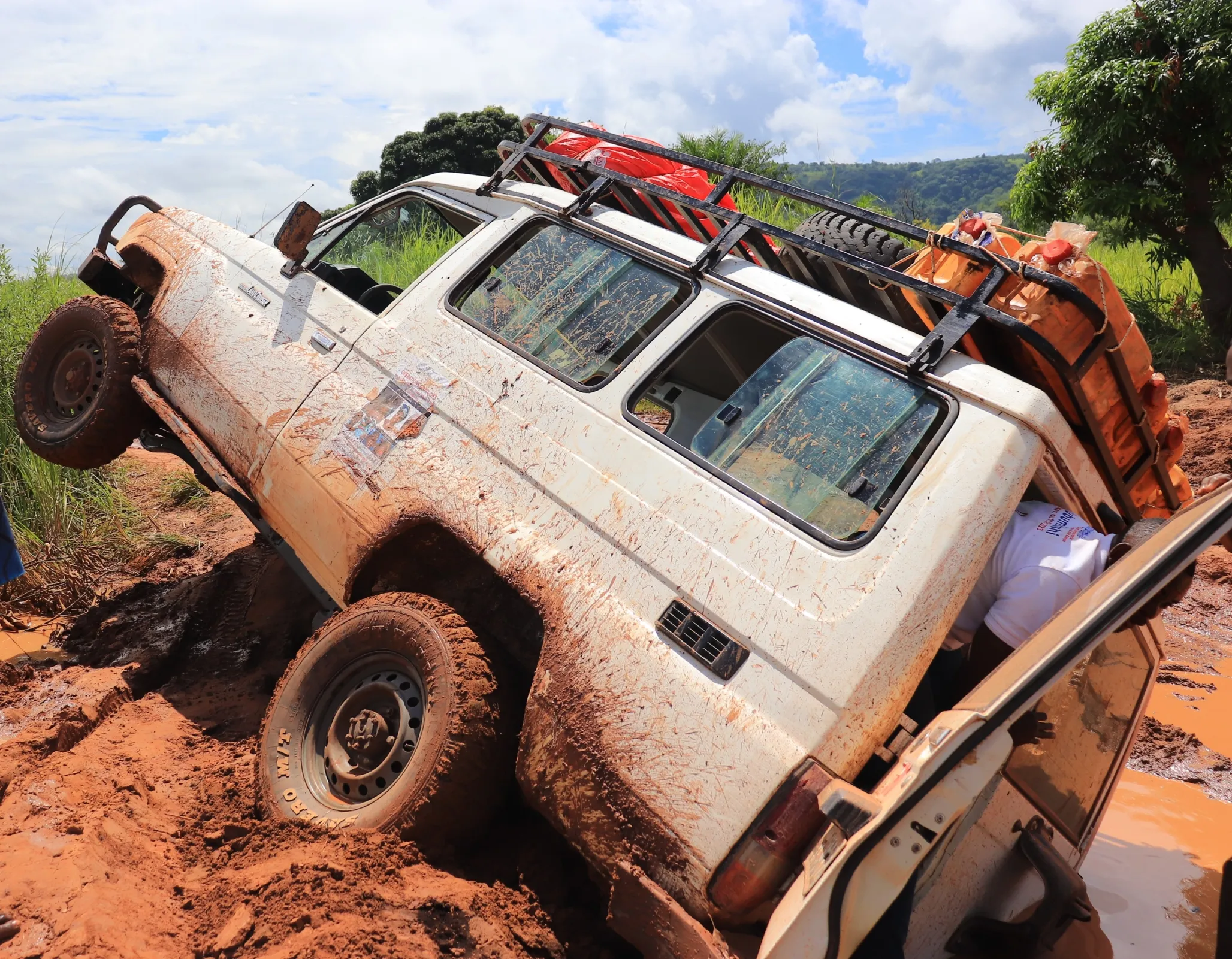 A vehicle from the DRC, stuck in the mud.