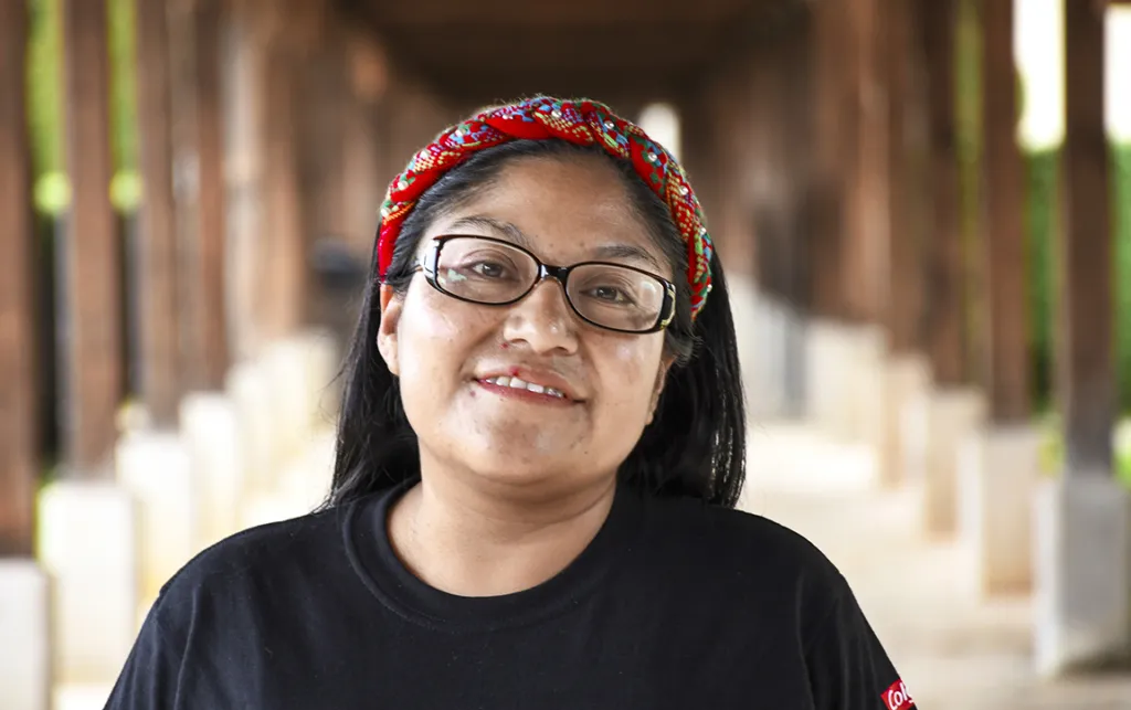 Volunteer Nurse Dominga smiles for the camera.