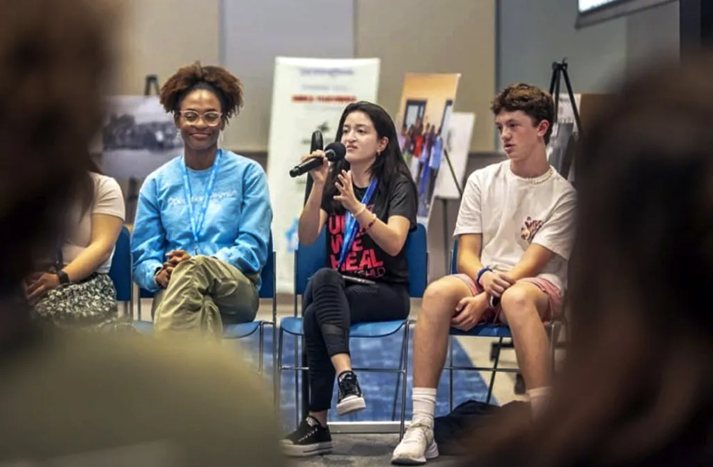 Angie speaks during an International Student Leadership Conference.