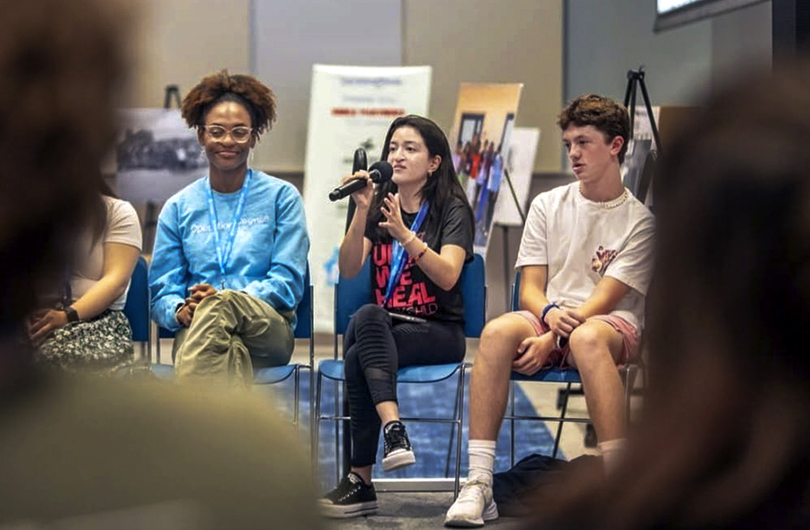 Angie speaks during an International Student Leadership Conference.