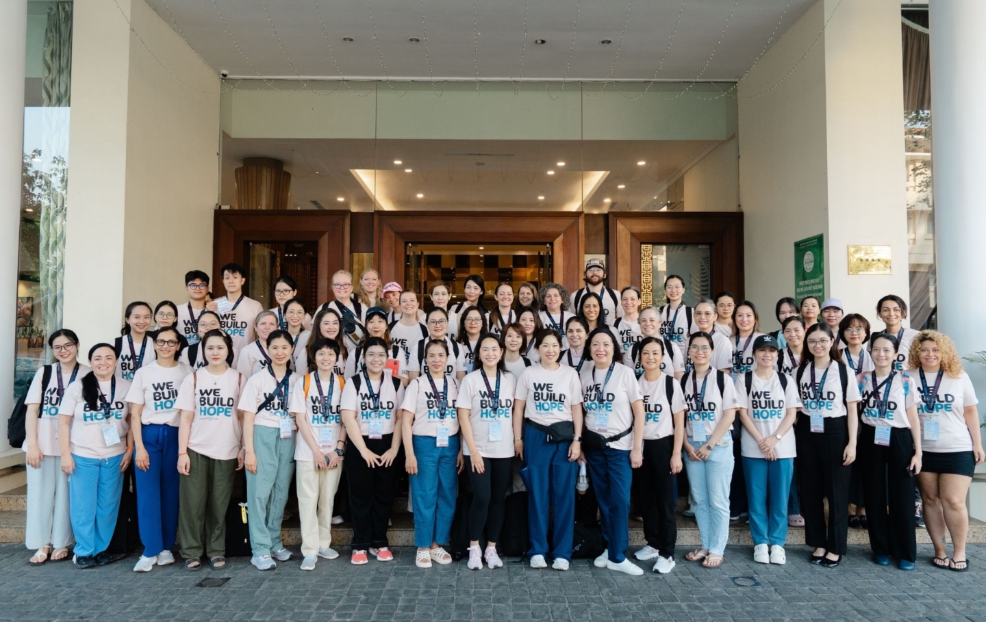 Volunteers pose for a picture during a dental program in Vietnam.