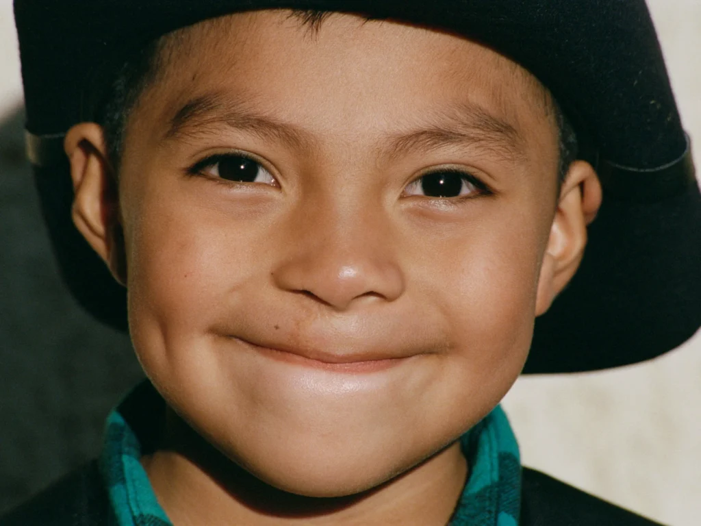 Junior Jeremias smiles for a photo.