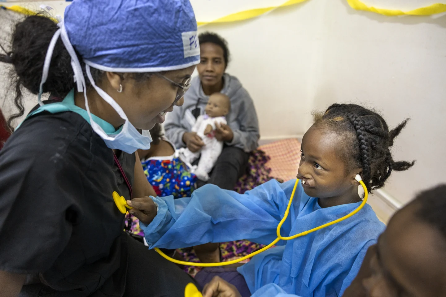 A health care provider shares a moment with a patient.