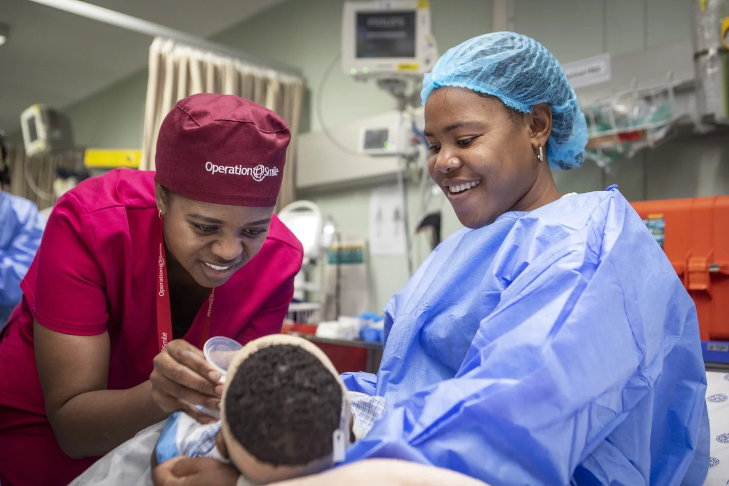 A nurse helps a patient in South Africa
