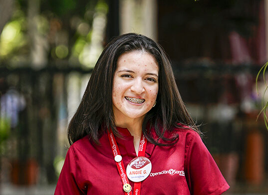 Angie smiles for the camera.