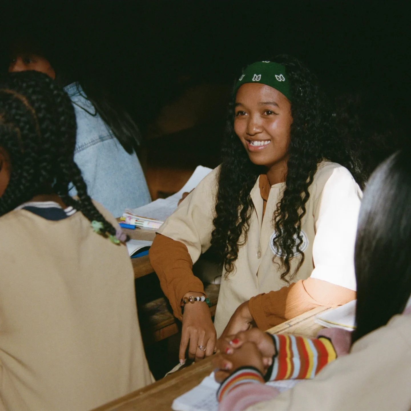 Narya laughs with friends.