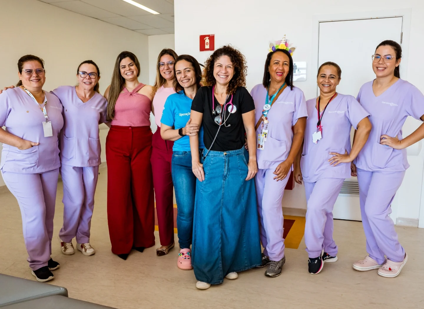 Volunteers pose for a photo during Brazil's first Women in Medicine program.