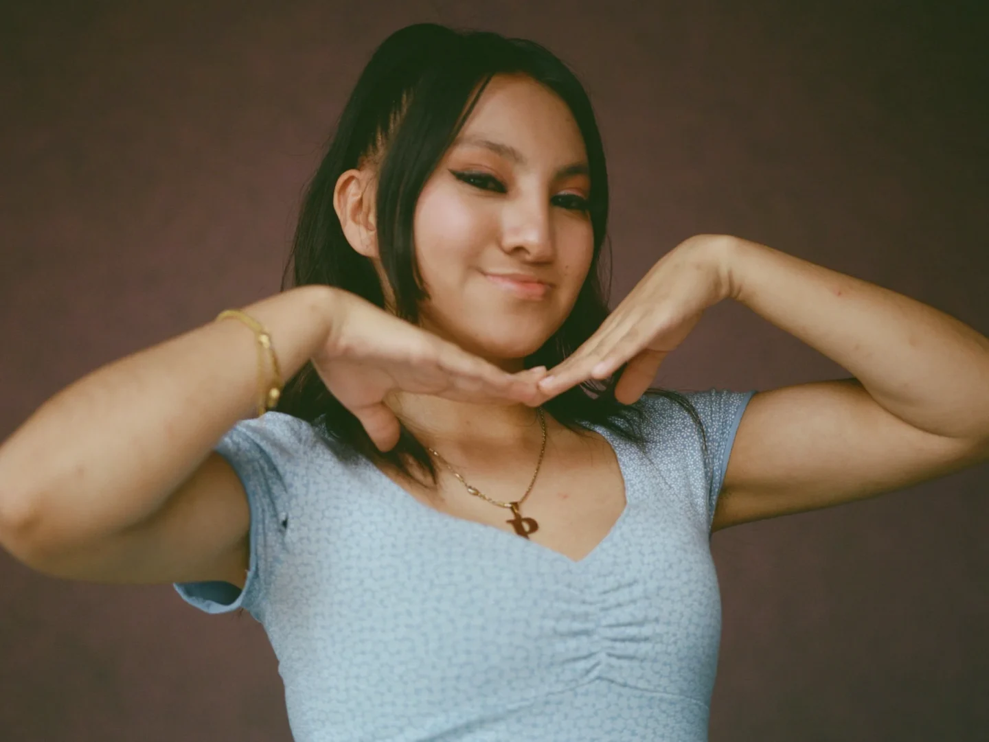 Palisha smiles for the camera.