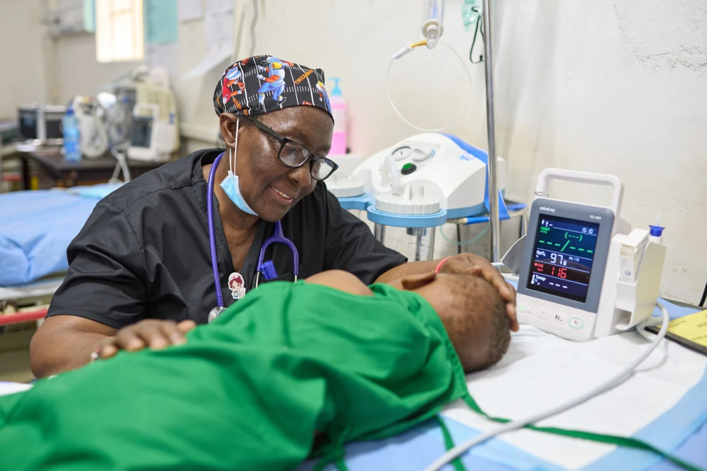 A nurse cares for a patient