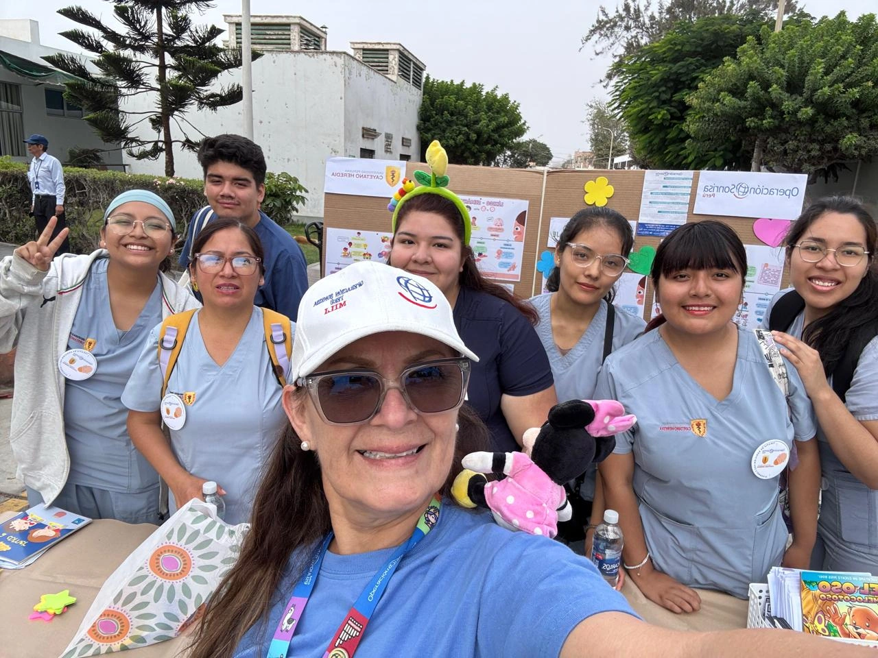 Speech therapist Milagros Rojas with other volunteers.