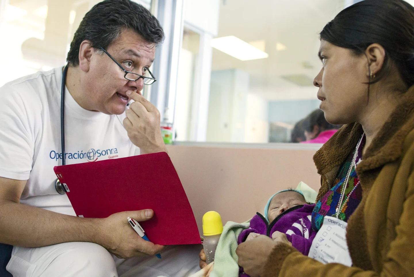 Dr. Sierra speaks with a patient's family.