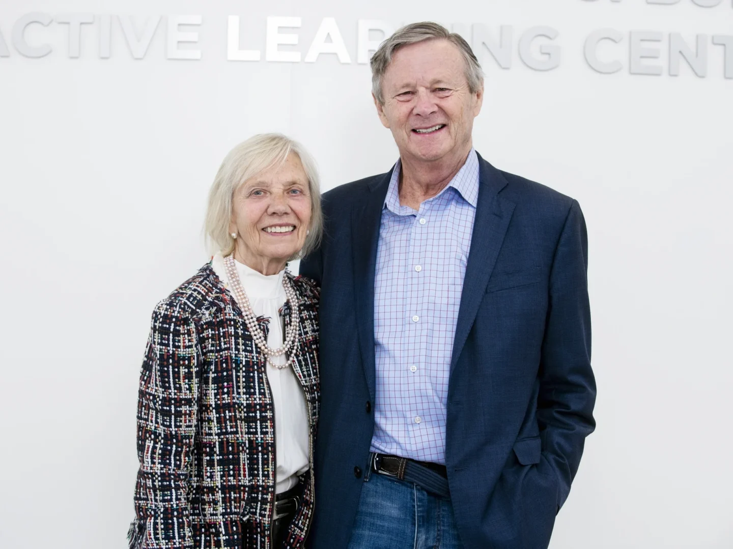 Kathy and Bill Magee smile at the camera.