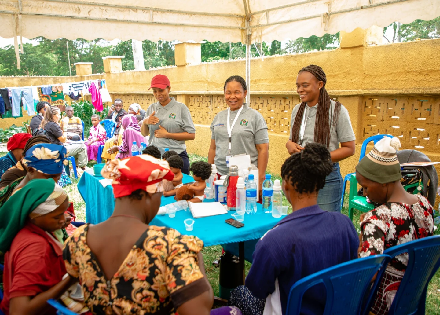 Volunteers speak to members of the community.