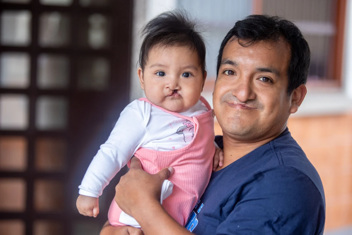 Miguel and his infant daughter Margaret.