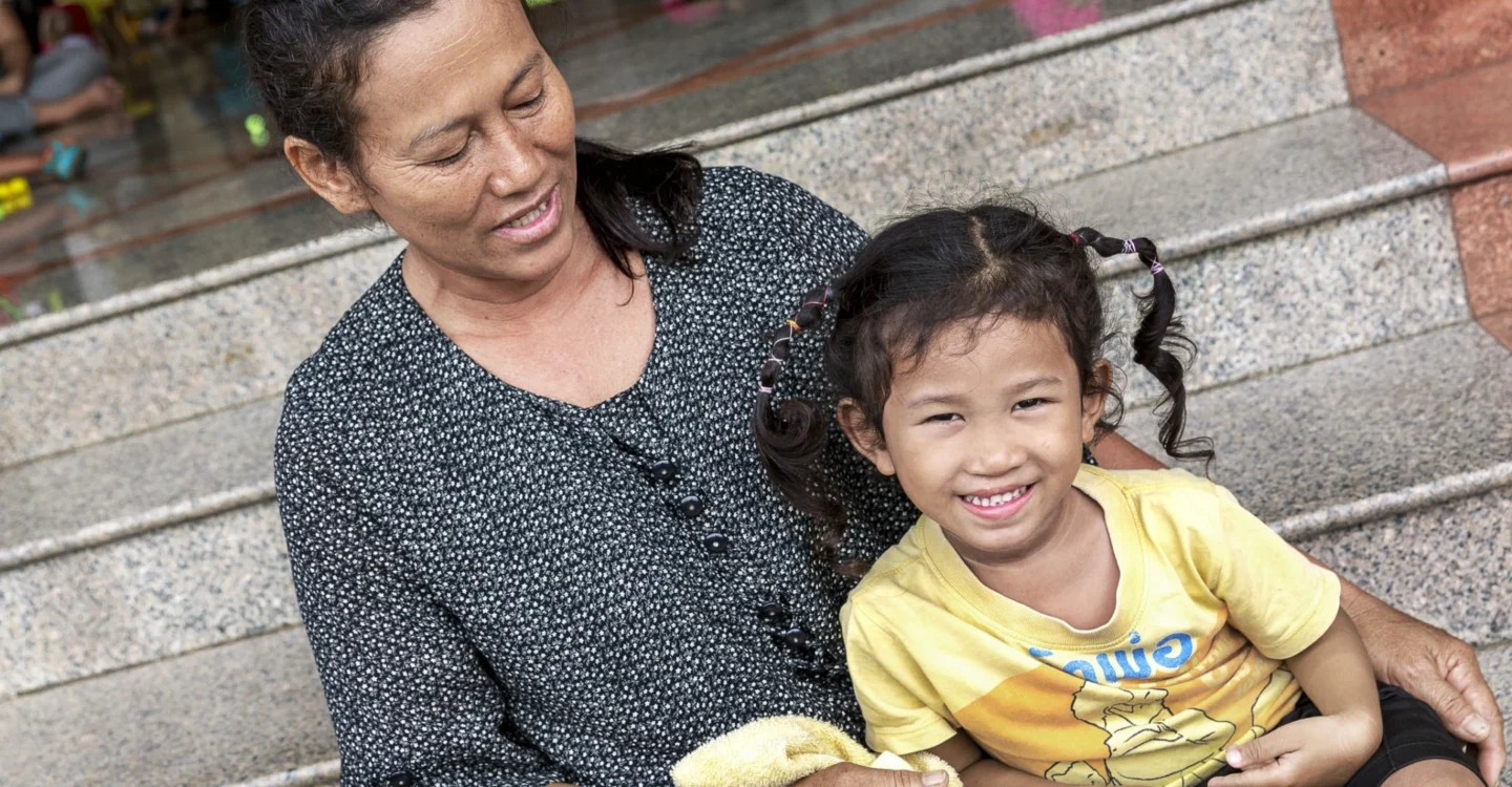 Tipayarat and her mother smile for the camera.