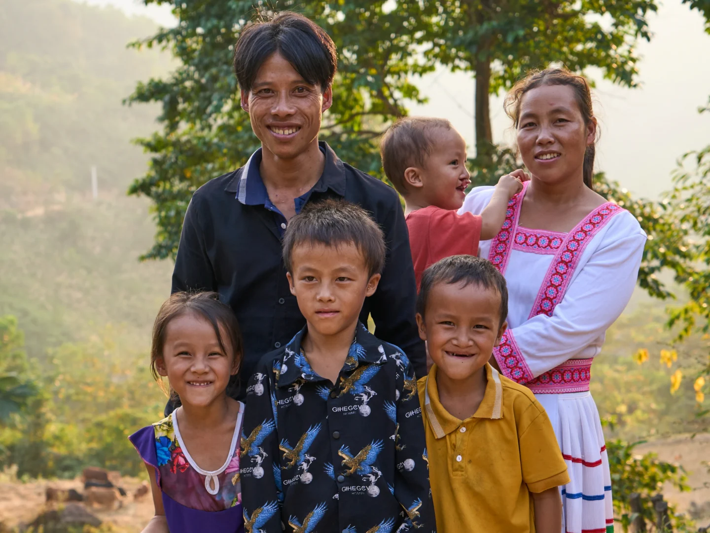 A family portrait of Phúc with his parents and siblings in Hung Loi, Vietnam.