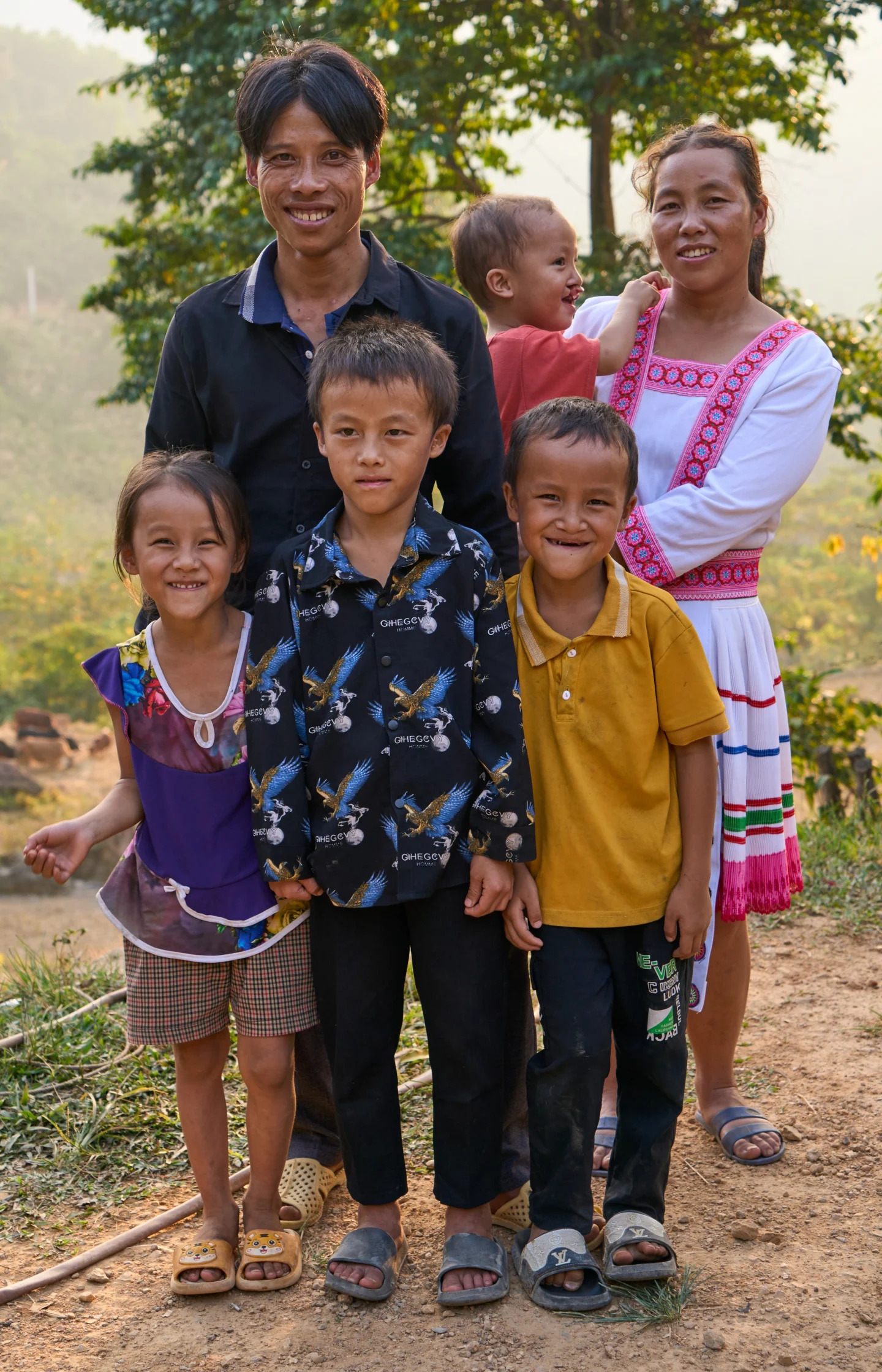 A family portrait of Phúc with his parents and siblings in Hung Loi, Vietnam.