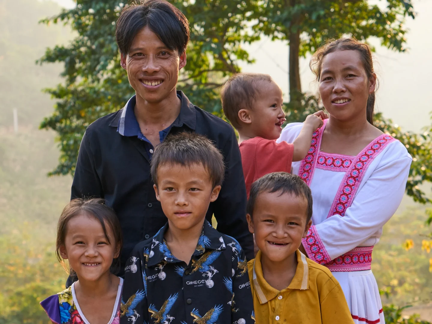 A family portrait of Phúc with his parents and siblings in Hung Loi, Vietnam.